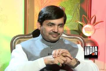 congress hatao will be our slogan rahul acts like a dabangg says syed shahnawaz hussain