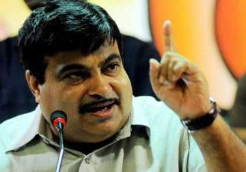 aap slams nitin gadkari on secret deal with congress