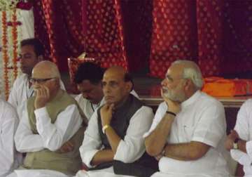 advani modi appear together at chikhaliya s condolence meeting