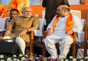 bjp appoints modi s confidante amit shah as up in charge