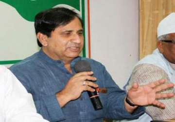 bjp lashes out at shakeel ahmed for gujarat riots tweet