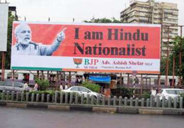 bjp puts up posters projecting narendra modi as hindu nationalist