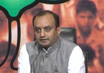 bjp targets up minister for riots