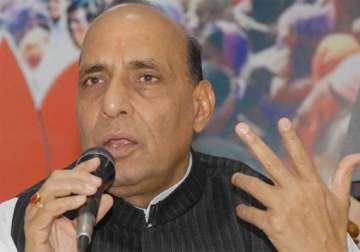 beware of congress rajnath cautions jd u