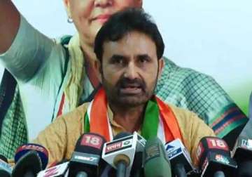 congress fires at bjp over adverse audit report on gujarat