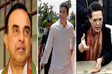 congress dares swamy to sue sonia rahul swamy says he will first await pm s reply