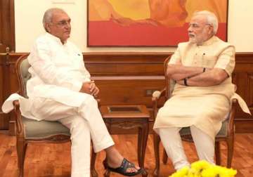 damage control after jeers hooda invited for tea by narendra modi