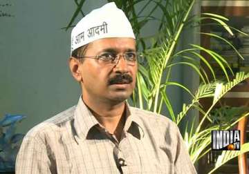 kejriwal promises to halve power bills in delhi provide 700 litres water daily free