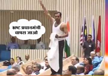 delhi lawyer tries to disrupt pm s speech takes off shirt shouts slogan go back