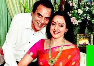 dharmendra s absence questioned as hema s campaign picks up