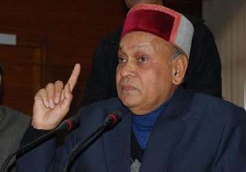 dhumal defends giving land on lease to ramdev