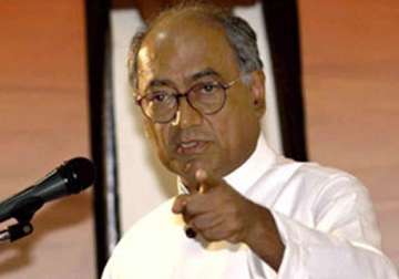 digvijay hits out at modi describes him as a pompous windbag