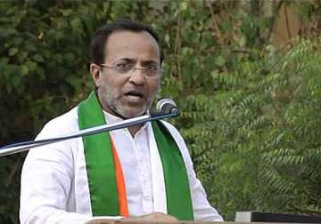 gujarat cong chief arjun modhwadia defeated ahmed patel confidante loses