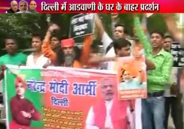 modi supporters protest outside advani s residence