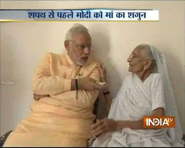 in pics modi gets rs. 101 as shagun from his mother hiraben