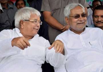 lalu prasad nitish kumar show bonhomie vow to send bjp packing in bihar