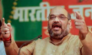 cops who filed charge sheet against amit shah transfered