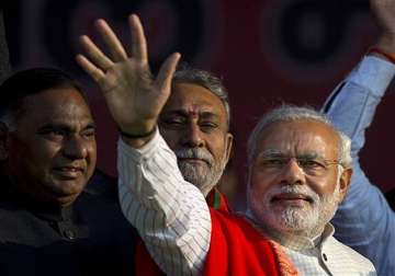 delhi polls defeat will increase enormous pressure on modi new york times