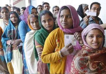 delhi polls live voting picks up in capital long queues outside polling booths