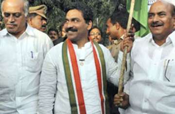 telangana cong serves show cause notices on mps