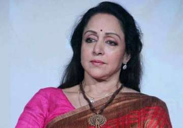 hema malini denies land grab allegations says will abide by law