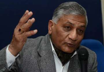 dog remark bjp stands by v k singh opp demands his ouster