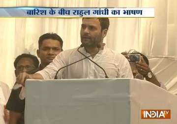 rahul gandhi targets pm modi in a rain hit rally