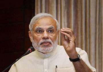 on hiroshima bombing day pm modi pitches for violence free world