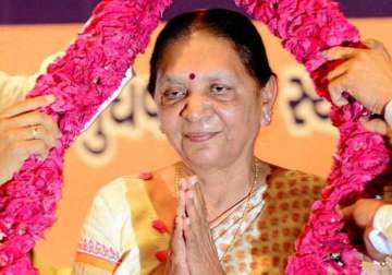 by polls gujarat cm on whirlwind campaign trail