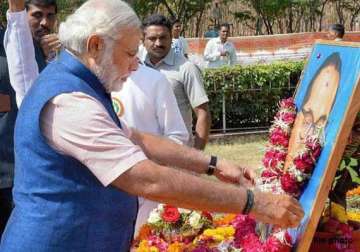 pm narendra modi pays tributes to ambedkar on his death anniversary
