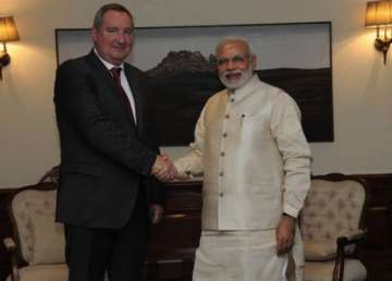 india attaches high importance to ties with russia pm