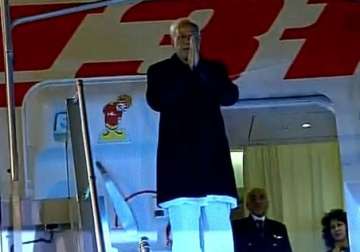 pm returns home after attending climate change conference in paris