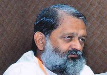 haryana health minister anil vij catches cid officer for spying on him