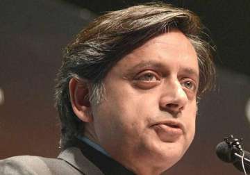 snubbed tharoor consulted by rahul gandhi in ls as he leads protest