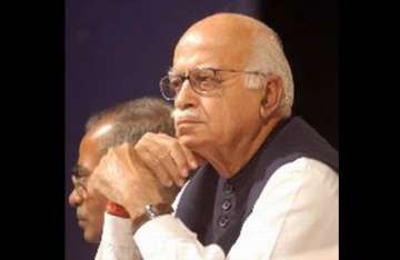 pm worried about tapping not corruption advani