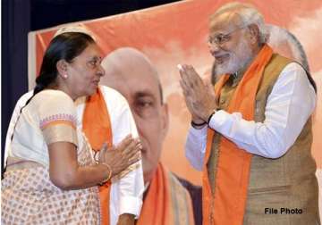 modi wishes gujarat cm on her birthday