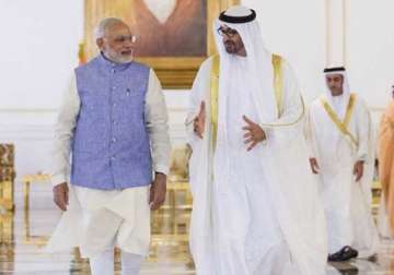 pm modi breaks protocol receives crown prince of abu dhabi personally