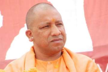 fir against adityanath for defying ban on poll meeting