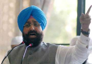 holy book row congress seeks resignation of badal sukhbir