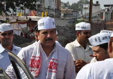 bhushan yadav worked for maligning aap s image sanjay singh