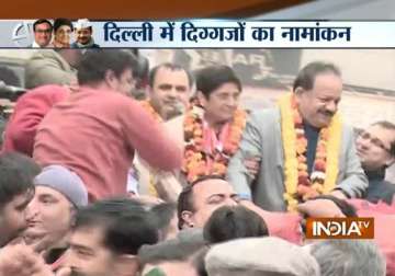 delhi polls kiran bedi arvind kejriwal file nominations