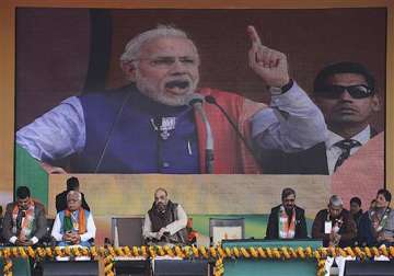 delhi polls bjp promises 50 power bill reduction if voted to power