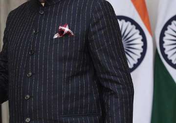 pm modi commends those who contributed in auction of pinstripe suit