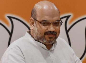 jharkhand polls contradiction in jharkhand cabinet as parties fight each other says amit shah