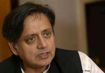 tharoor accuses modi of silence on conversion other issues