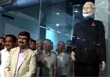 rs. 1.11 crore bid for modi s pinstripe suit auction in progress