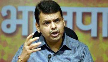 after gadkari cm fadnavis accused of riding without helmet