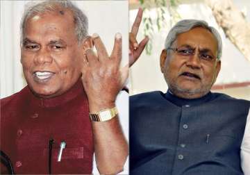 bihar crisis nitish stakes claim to form govt manjhi confident of proving majority