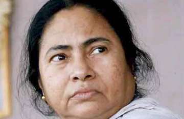 mamata slams centre but says she won t walk out of upa