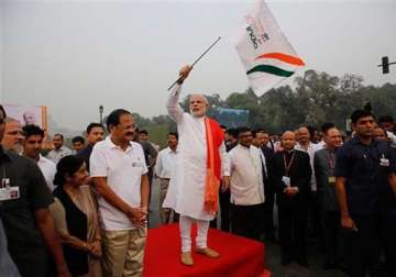 in pics narendra modi flags off run for unity
